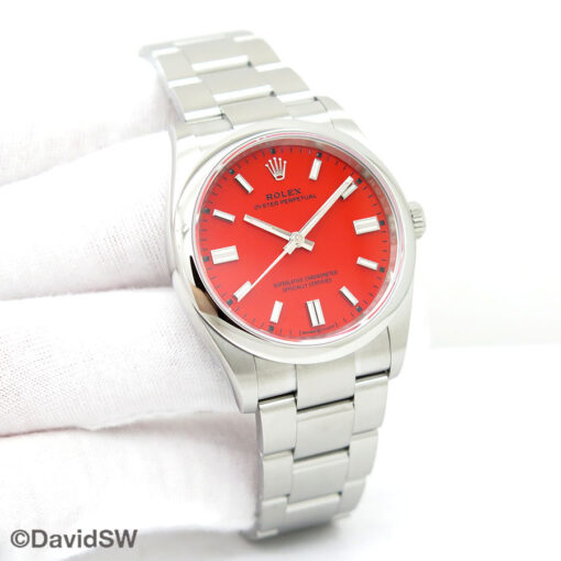 Rolex 126000 Oyster Perpetual with Coral Red Dial