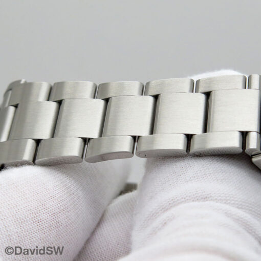 Rolex 126000 Oyster Perpetual with Coral Red Dial - Image 8