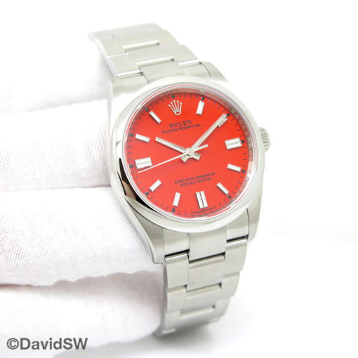 Rolex 126000 Oyster Perpetual with Coral Red Dial