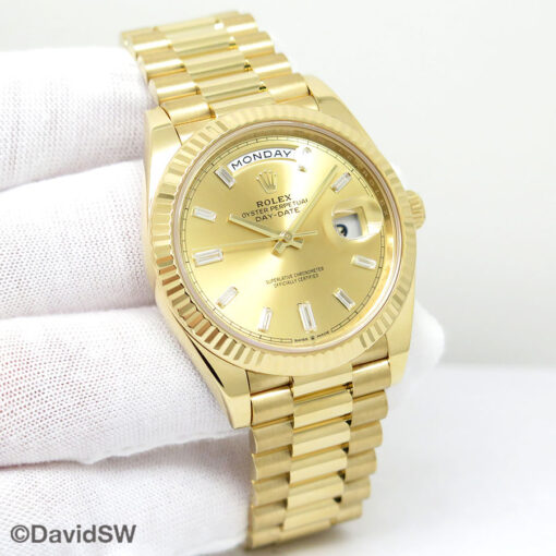 Rolex 228238 Day Date 40 18K Yellow Gold with Champagne Baguette Diamond Dial