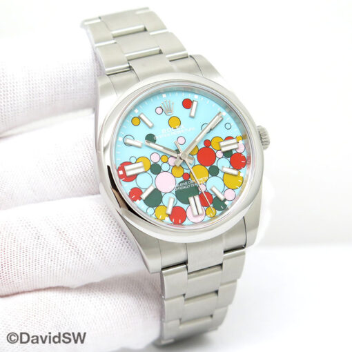 Rolex 124300 Oyster Perpetual 41 with Turquoise Celebration Motif Dial