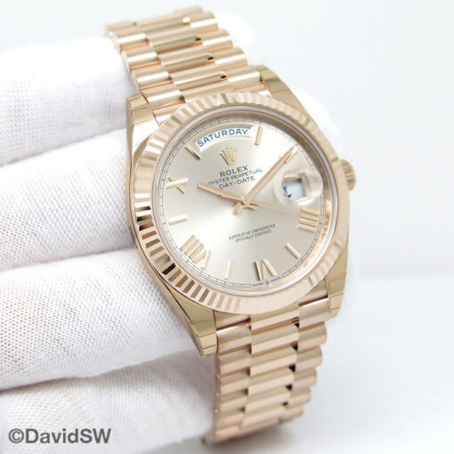 Rolex 228235 Day Date 40 18K Rose Gold with Sundust Roman Dial
