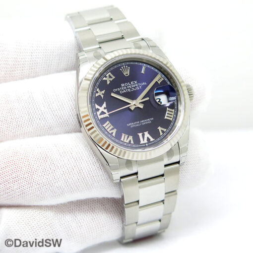Rolex 126234 Datejust with Aubergine Roman Diamond “VI” and “IX” Dial on Oyster (New Old Stock)