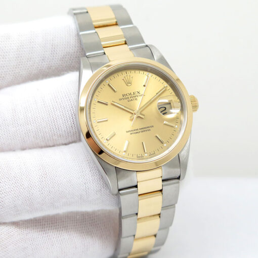 Rolex 15203 Oyster Perpetual Date 18K/SS with Champagne Stick Dial