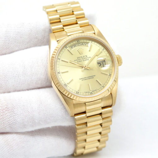 Rolex 18038 Day Date 18K Yellow Gold with Champagne Stick Dial