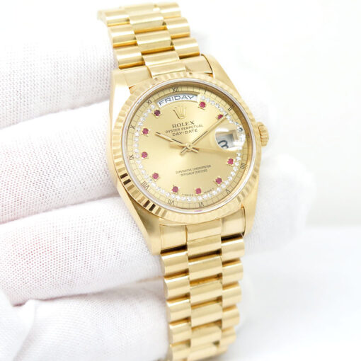 Rolex 18238 Day Date 18K Yellow Gold with Champagne Diamond String Ruby Dial