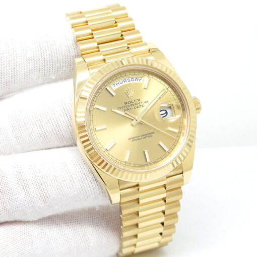 Rolex 228238 Day Date 40 18K Yellow Gold with Champagne Stick Dial