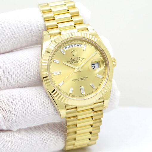 Rolex 228238 Day Date 40 18K Yellow Gold with Champagne Baguette Diamond Dial