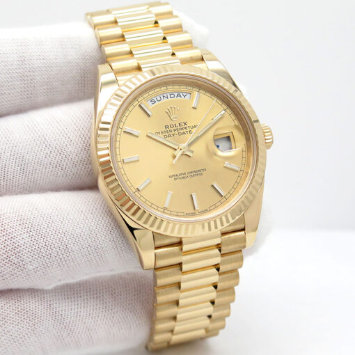 Rolex 228238 Day Date 40 18K Yellow Gold with Champagne Stick Dial