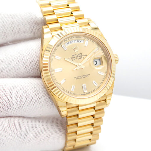 Rolex 228238 Day Date 40 18K Yellow Gold with Champagne Baguette Diamond Dial