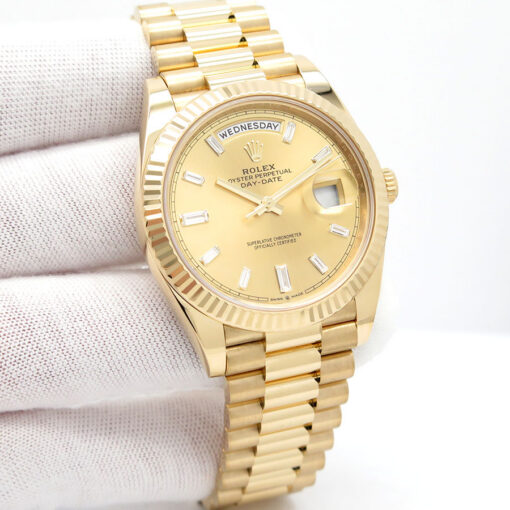 Rolex 228238 Day Date 40 18K Yellow Gold with Champagne Baguette Diamond Dial