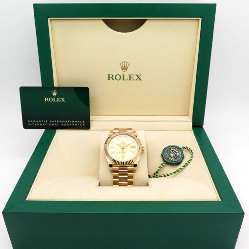 Rolex 228238 Day Date 40 18K Yellow Gold with Champagne Baguette Diamond Dial (New Old Stock) - Image 2