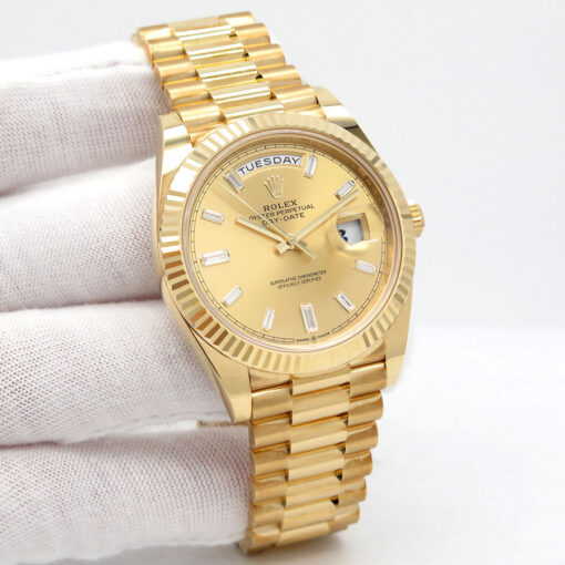 Rolex 228238 Day Date 40 18K Yellow Gold with Champagne Baguette Diamond Dial (New Old Stock)