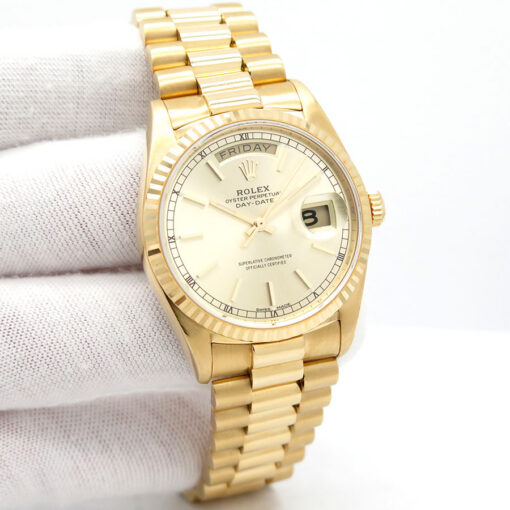 Rolex 18038 Day Date 18K Yellow Gold with Champagne Stick Dial