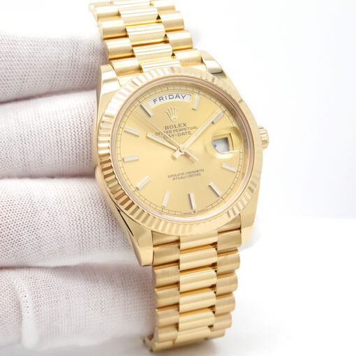 Rolex 228238 Day Date 40 18K Yellow Gold with Champagne Stick Dial