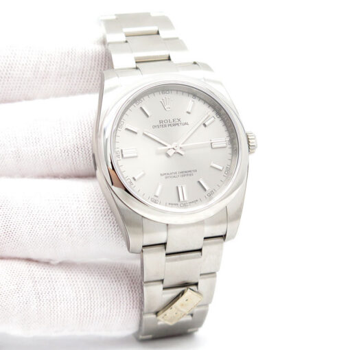 Rolex 116000 Oyster Perpetual "Domino's Pizza" with Steel Stick Dial (New Old Stock)