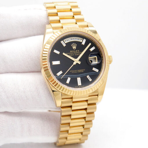 Rolex 228238 Day Date 40 18K Yellow Gold with Black Onyx Diamond Baguette Dial